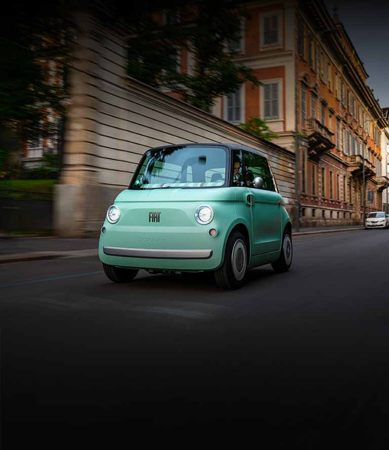 The 2023 Fiat being driven at speed off-road in snow, with clouds of snow obscuring its wheels.